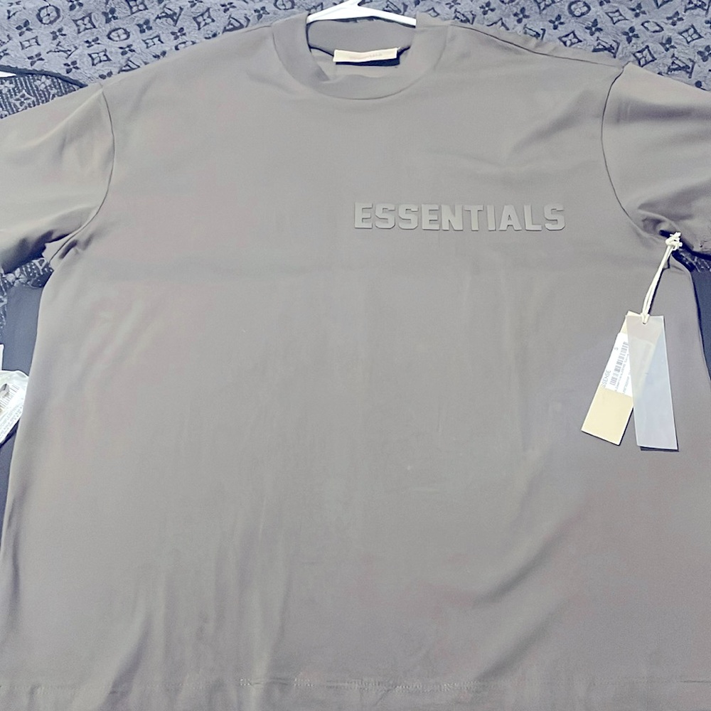 Brand new essential fear of god shirt size small but fits like med/lg